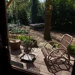 Holiday home Knus Boshuisje Onder De Eiken *